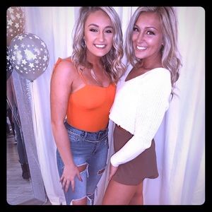 Bright orange bodysuit